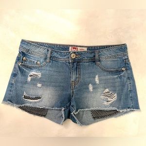 Juniors Lei Denim shorts with distressing. Extra long pockets with stars Size 9